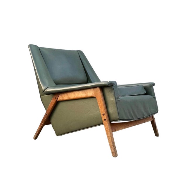 A Vintage Lounge Chair Attributed to Folke Ohlsson for Dux. Unmarked. Chair will require complete reupholstery as well as...