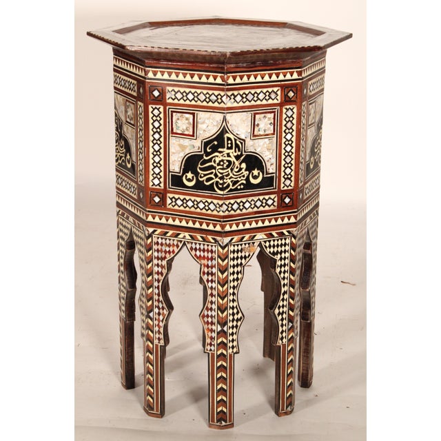 Pair of Levantine mother of pearl and bone inlaid occasional tables, early 21st century. With octagonal tops with mother...