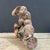 Add a touch of warmth, whimsy, and traditional Chinese artistry to your space with this charming vintage Shiwan pottery...