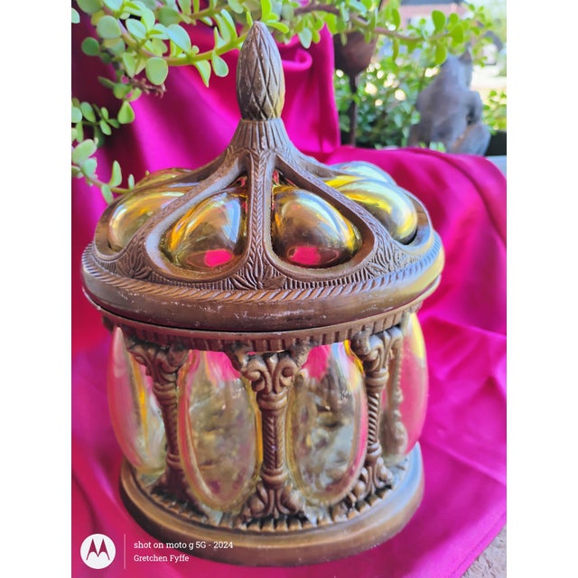 Baroque Bronze Encased Bubble Glass Apothecary Jar in a lovely lemony glass hue. Fine construction with a pleasing lid...