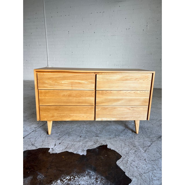 Beautifully refinished vintage blonde dresser, featuring 6 drawers with etched detailing that move perfectly and tapered...