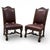 Pair of 2 dining chairs by Henredon. Features an exposed wood frame with finely carved details. Shapely carved legs are...