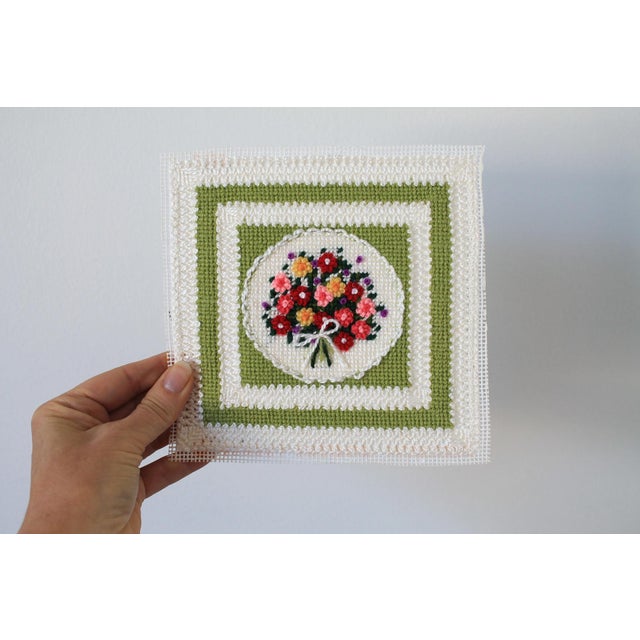 Colorful vintage unframed floral needlepoint wall hanging. No makers mark. Some light discoloration on the bottom edge....