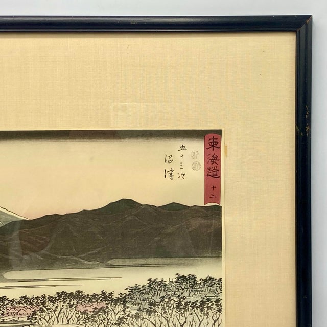 This 1950s reproduction woodblock print is from an original woodblock print titled Numazu (Station 13) from the series The...