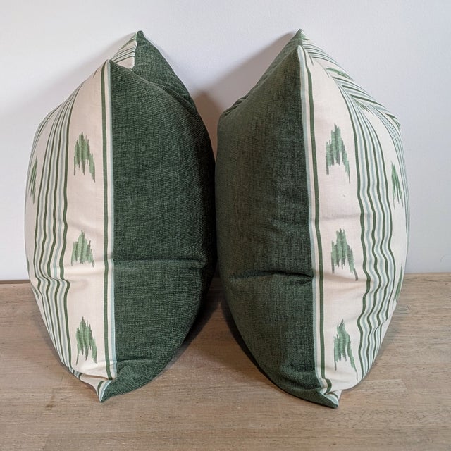 Schumacher Santa Barbara Ikat in leaf. Fun ikat stripe print in multiple greens on a cream background. Coordinating green...