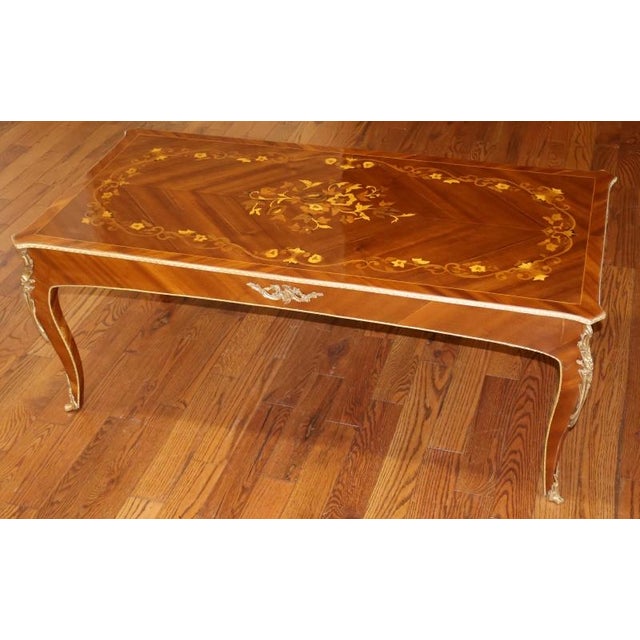Louis XV French Style Walnut Inlaid Ormolu Mounted Cocktail Coffee Table Dimensions :48" Wide X 24" Deep X 19" Tall A...