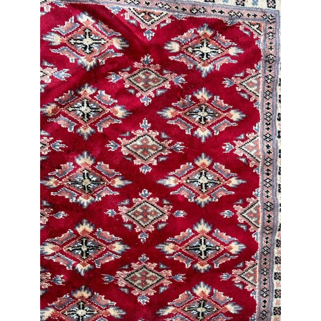 Pretty small vintage Pakistani rug with nice geometrical design in style of Turkmen rugs, and beautiful colours with red...
