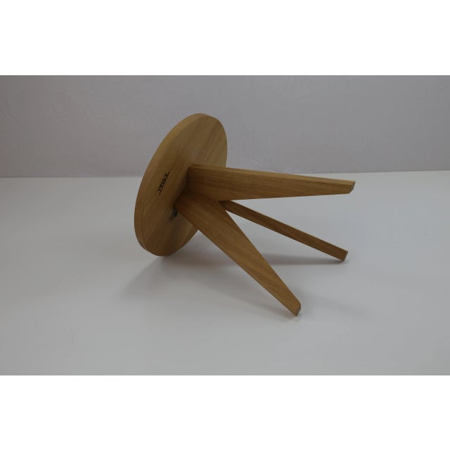 The light brown Lollipop side table is handmade with natural oak and oiled. Imprinted by Maker,Imprinted by Maker