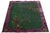 This hand-knotted antique Chinese Art Deco rug features a green field with a multicolored floral design and a purple wool...