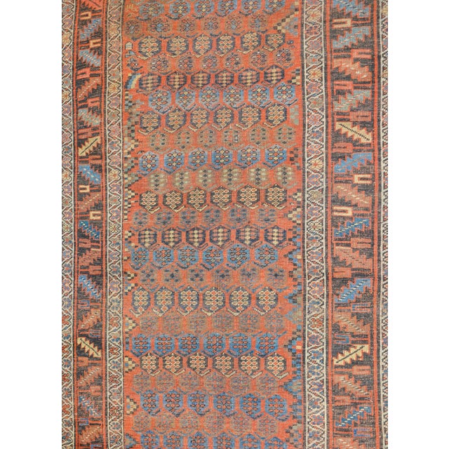 A fantastic late 19th century Persian Bidjar rug with an all-over stylized paisley pattern woven in brown, indigo, white,...
