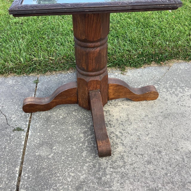 Solid and sturdy oak table base with Marble gaming top. Excellent condition whether it's checkers or chess this is a great...