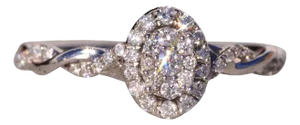 The Cotal: Cluster Set Natural Diamond Ring in White Gold