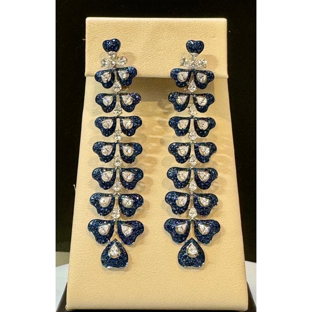 6 Ct Natural Blue Sapphire & 3 Ct Diamond hanging Earrings in 18Kt White Gold 3" A fabulous pair of earrings that exudes a...