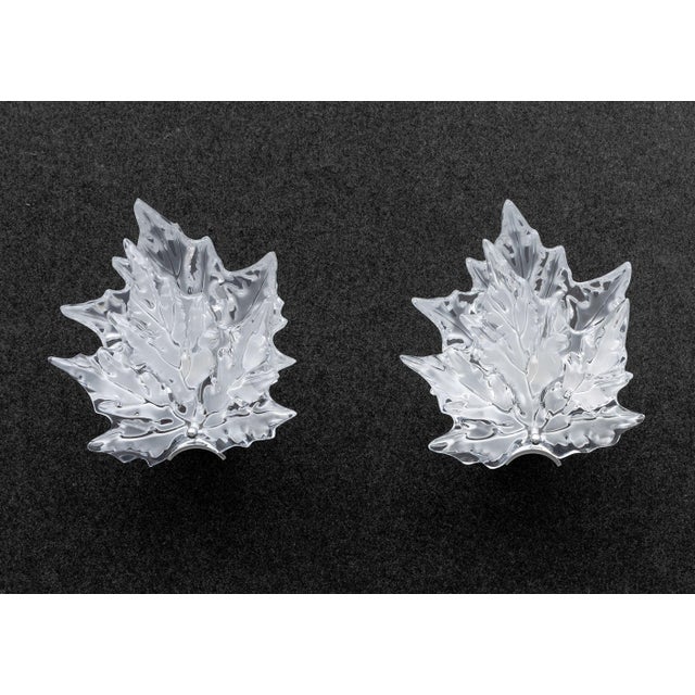 Pair of Lalique Crystal "Champs Elysees" Wall Sconces, each marked "Lalique France" to frosted crystal leaf form shade,...