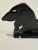 Charming cast iron boot scraper or doorstop in the form of a long-bodied Dachshund with floppy ears, short legs and a...