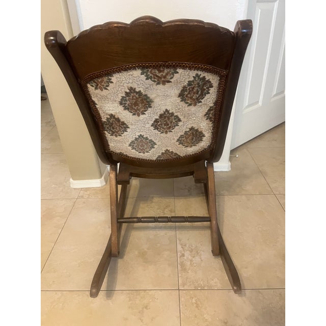 Lovely antique Victorian-style folding rocking chair, commonly referred to historically as a nursing rocker or sewing...