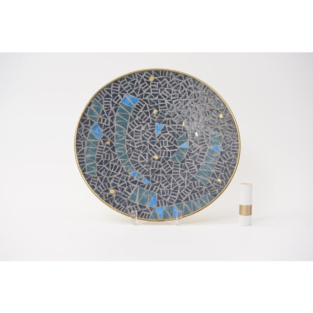 This wall plate/bowl was designed by the designer and craftsman W. Zimmermann and manufactured in the 1950s/1960s by...