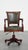 Offered this charming green cowhide leather and wood office chair with decorative English style rivets on wheels. This...