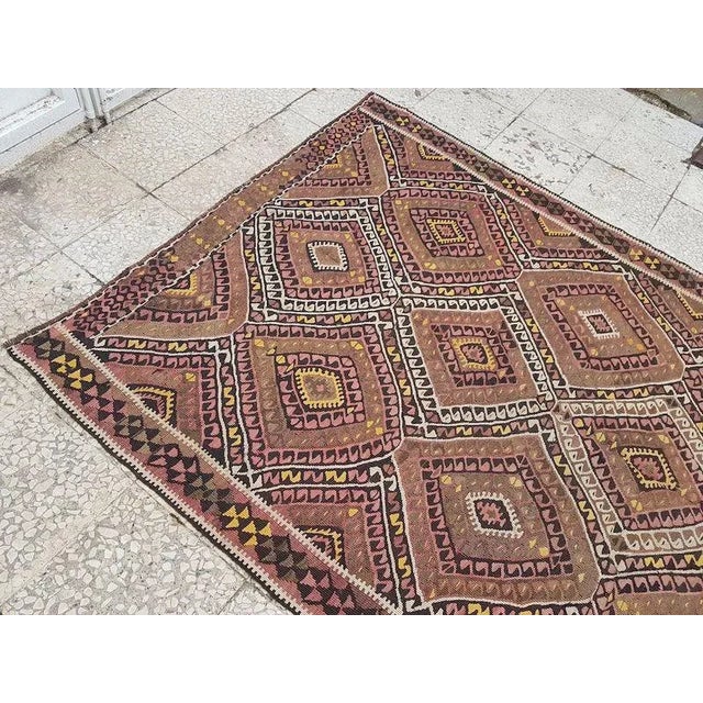 This is a vintage runner from the eastern part of turkey. The piece was naturally dyed and handmade in the 1960s.