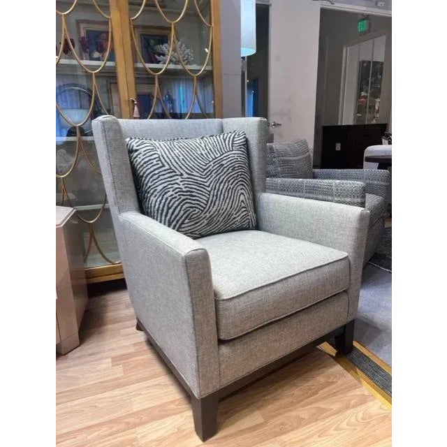This moderate scale wing chair has an ultra down seat cushion with a blend down cushion. Decorative pillow is included.