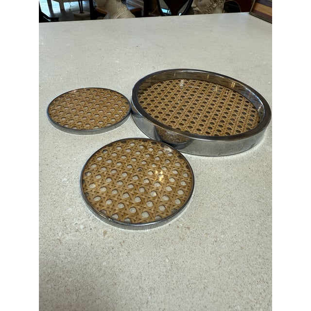 Elegant Italian modern serving set composed of one circular tray and three matching coasters, produced in Italy circa...