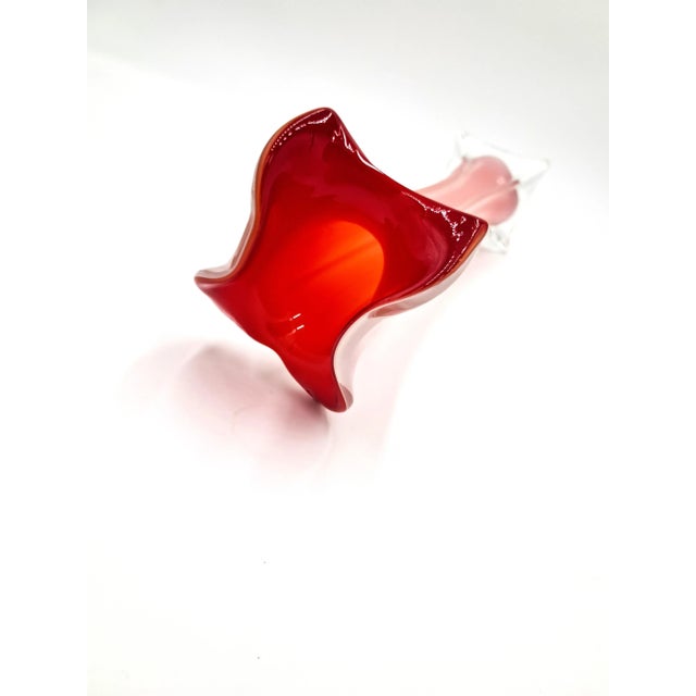 This striking art glass vase was made in the style of Murano and features a tulip or Jack-in-the pulpit mouth. It is 13.5...