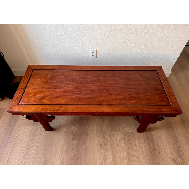 Beautiful handcrafted coffee table made entirely from solid hardwood (possibly mahogany). Features a rich reddish-brown...