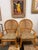 ⸻ Title: Pair of 1970s Rattan Lounge Chairs with Zebra Upholstery (Two Pairs Available) Description: Vintage 1970s rattan...