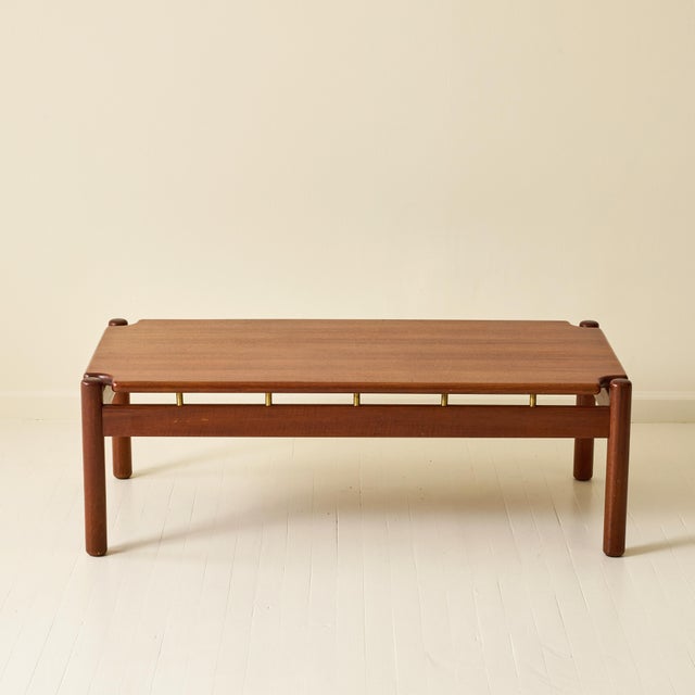 Coffee table by Finnish designer Ilmari Tapiovaara, produced by La Permanente di Cantù, 1960s. Constructed with a wooden...