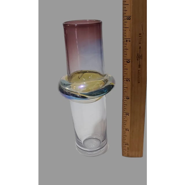 This unique and eye-catching vase is a true work of art. Handcrafted by skilled artisans using a traditional technique of...