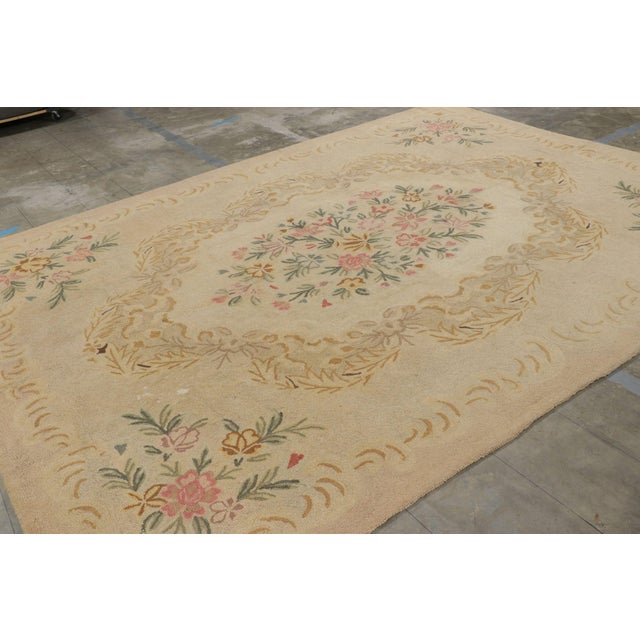 Handmade in wool and originating in China in circa 1940-50, this 9x12 rug is a rare and exciting new curation in Rug &...