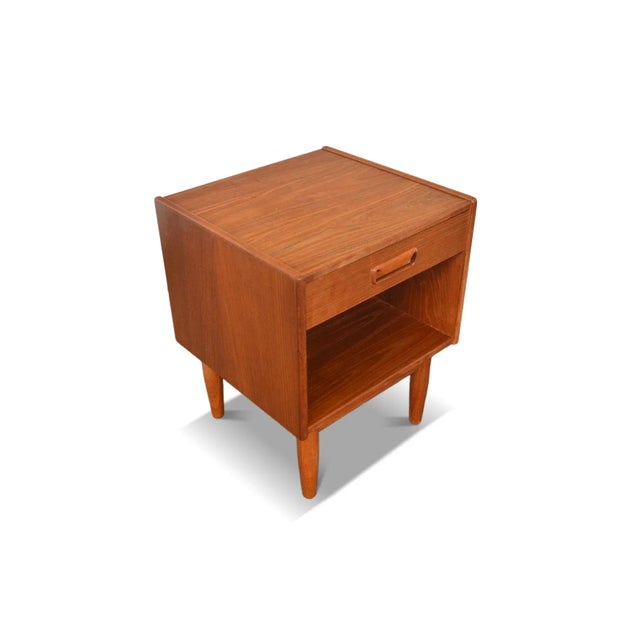 Origin: Denmark Designer: Gunnar Nielsen Manufacturer: Tibergaard Era: 1960s Materials: Teak Measurements: 18″ wide x 17″...