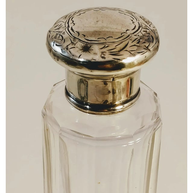 Gorgeous Sterling finial top screw lid on a beveled glass dresser bottle. No monograms open cartouche. Stamped Hallmarks...