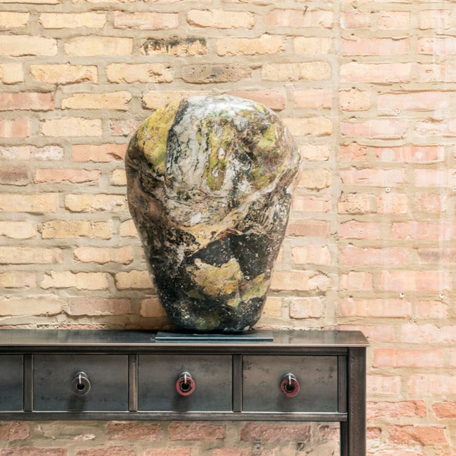 Unearthed in Jiangsu province, this stone has been polished to reveal the full array of its soft colors and intriguing...