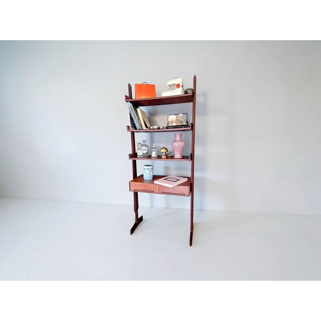 Freestanding single-module teak bookcase made by dassi in the 1960s. The bookcase is in excellent vintage condition and,...