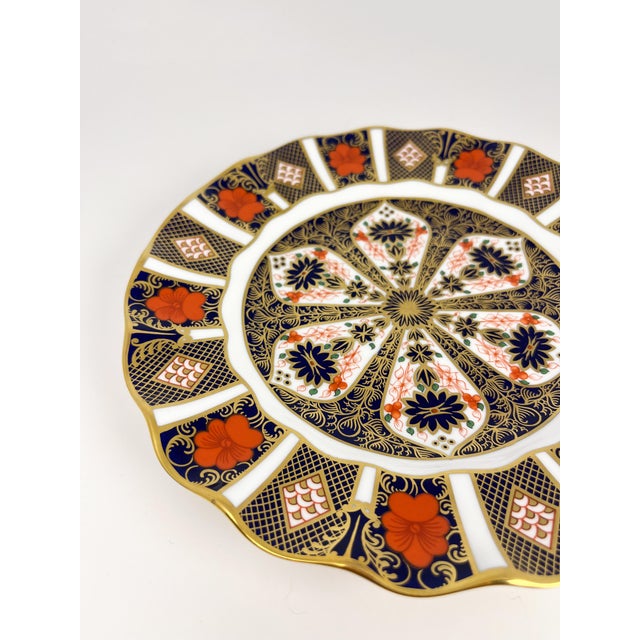 Royal Crown Derby Old Imari 1128 fluted 8.5" dessert plate. In excellent condition, with no chips, cracks, crazing, or...