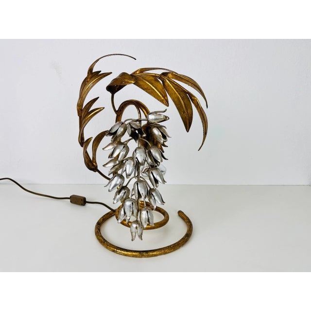 An extraordinary table by Hans Kögl made in Germany in the 1950s. The lamp has a beautiful wheat sheaf design. It is made...