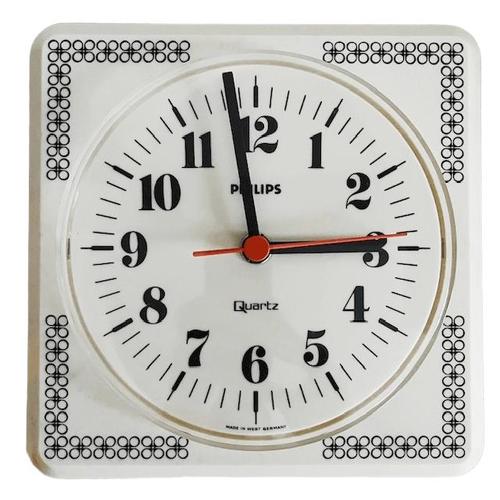 Cool vintage Philips kitchen clock from the 1980s in cream white and black. This vintage Philips wall clock has a square...
