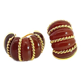 Late 20th Century Pair of Seaman Schepps 18k Yellow Gold Carved Translucent Amber Shrimp Earclips For Sale