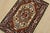 A traditional tribal Heriz rug hand-knotted with fine wool on a cotton foundation. This oriental rug features a central...