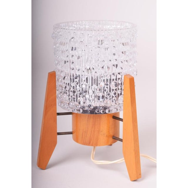 Maker: dřevo-humpolec model: 107/s this charming table lamp dates back to the 1960s and is a prime example of the...
