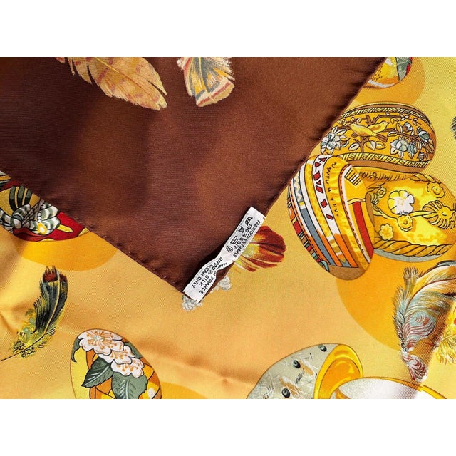 About This Piece: and rare, the Hermes "Des œufs" scarf, designed by Caty Latham, is a vintage masterpiece. Crafted from...