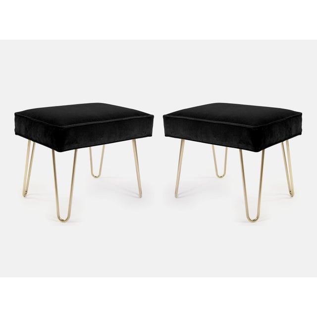 The perfect addition to any space! Wonderfully proportioned pair of petite ottomans upholstered in a supple Noir Velvet of...