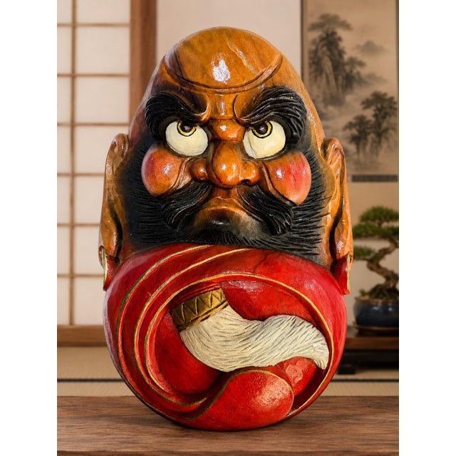 A wonderfully expressive vintage hand-carved wood wall sculpture depicting Daruma, also known as Bodhidharma, one of the...