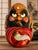 A wonderfully expressive vintage hand-carved wood wall sculpture depicting Daruma, also known as Bodhidharma, one of the...