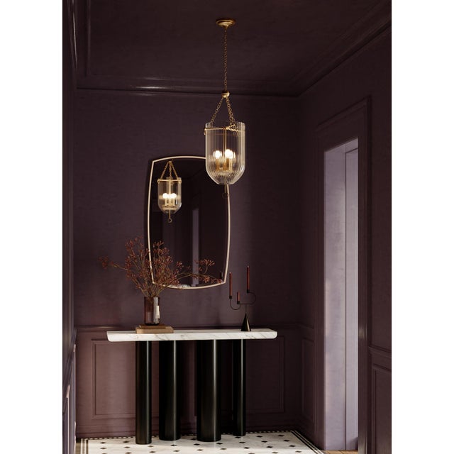 Defined by beveled glass and slender frame the Radiant Mirror captures light along its edges, creating a subtle gem-like...
