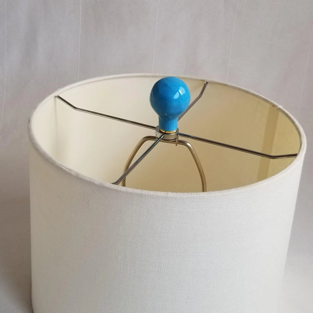 Pair of turquoise, large round, organic shaped, ceramic lamp finials. These ceramic finials were first hand-formed in...