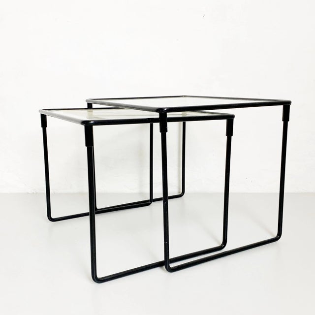 Italian Mid-Century Modern set of metal and glass coffe tables, 1970s Set of square coffee tables with structure in metal...