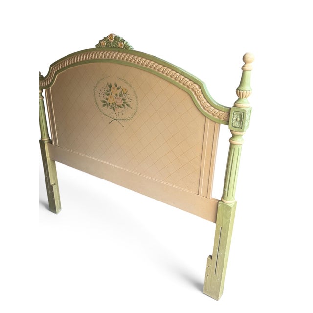 Charming vintage French Provincial style bed featuring an elegantly arched headboard and coordinating footboard, finished...