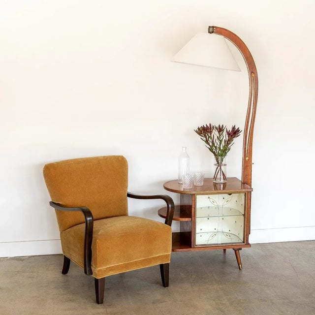 Spectacular Art Deco dry bar floor lamp from France, 1930's. Wood arm overhanging lamp and light inside cabinet with...